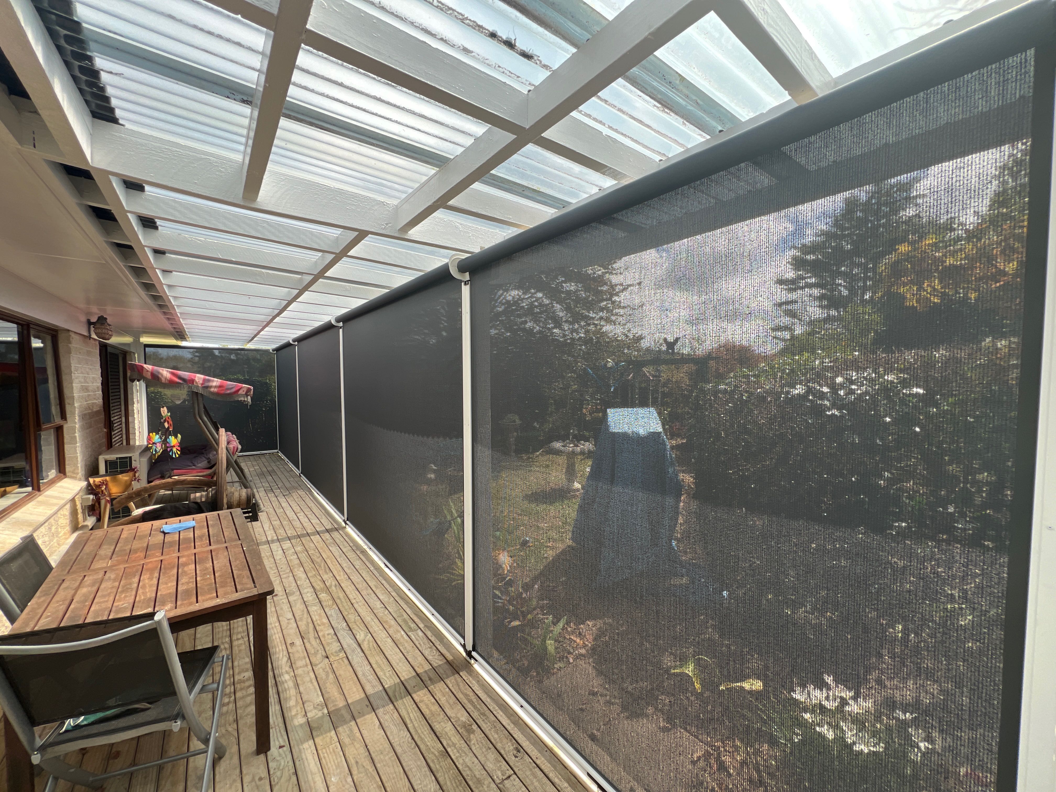 Furnished lounge under cover with blinds